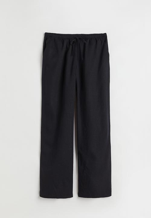 H&M - Wide trousers - black