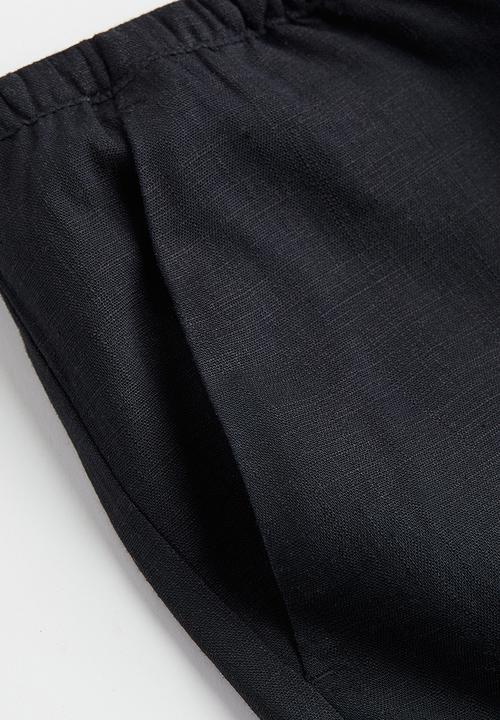 H&M - Wide trousers - black
