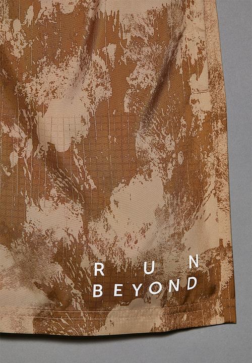 H&M - Fast-drying sports shorts - beige patterned