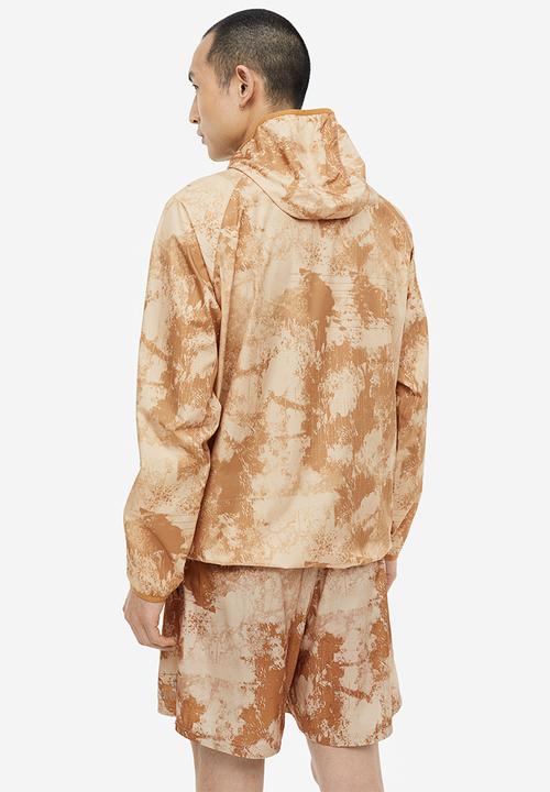 H&M - Fast-drying sports shorts - beige patterned