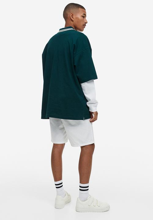 H&M - Oversized fit polo shirt - dark green rad grades 