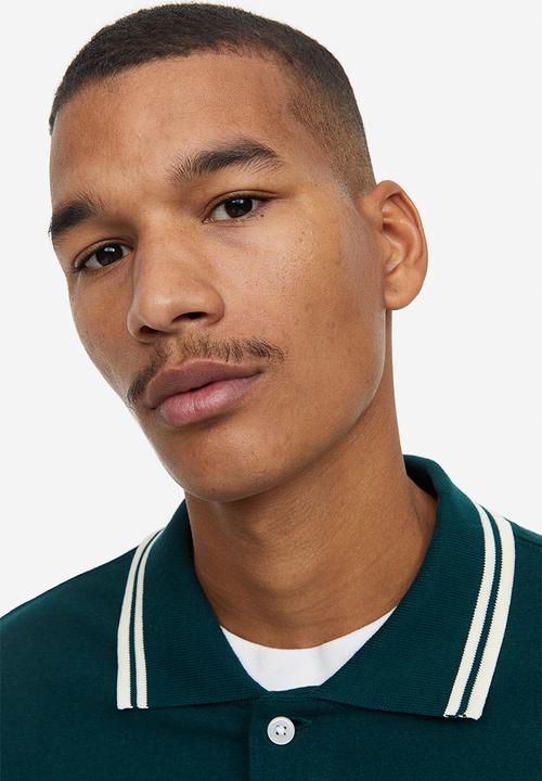 H&M - Oversized fit polo shirt - dark green rad grades 