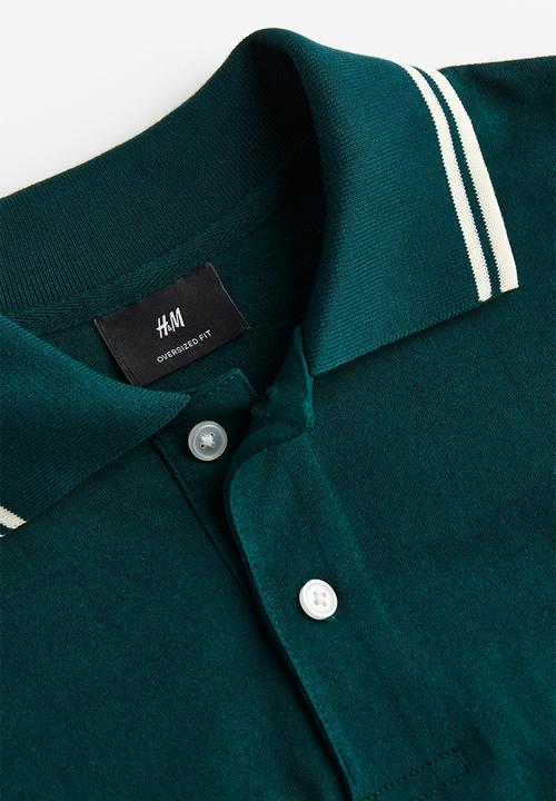 H&M - Oversized fit polo shirt - dark green rad grades 