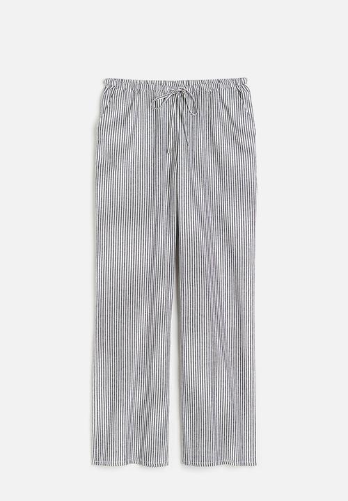 H&M - Wide trousers - dark blue striped