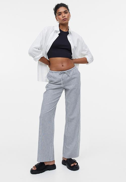 H&M - Wide trousers - dark blue striped