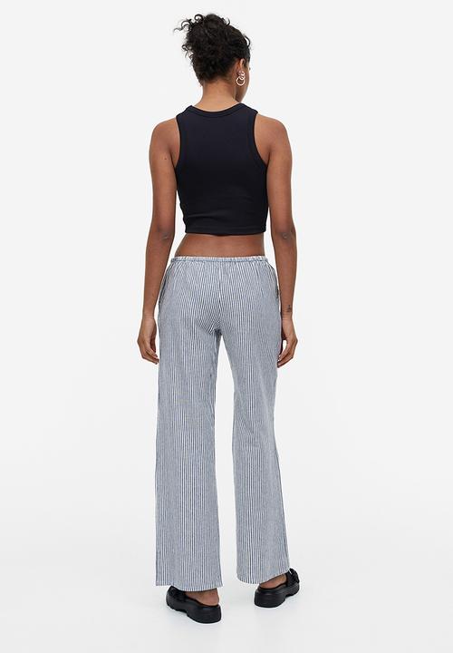 H&M - Wide trousers - dark blue striped