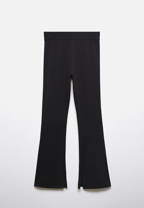 MANGO - Leggings flaret - black