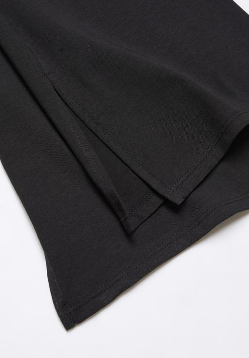 MANGO - Leggings flaret - black