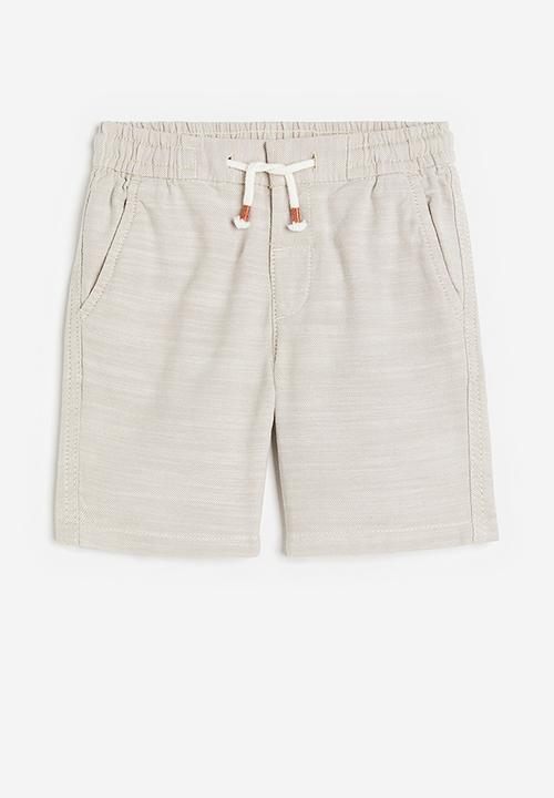 H&M - Loose fit chino shorts - light beige