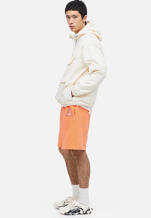 H&M - Relaxed fit printed sweatshorts - orange mountain