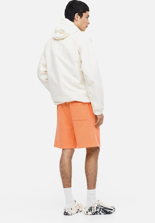H&M - Relaxed fit printed sweatshorts - orange mountain