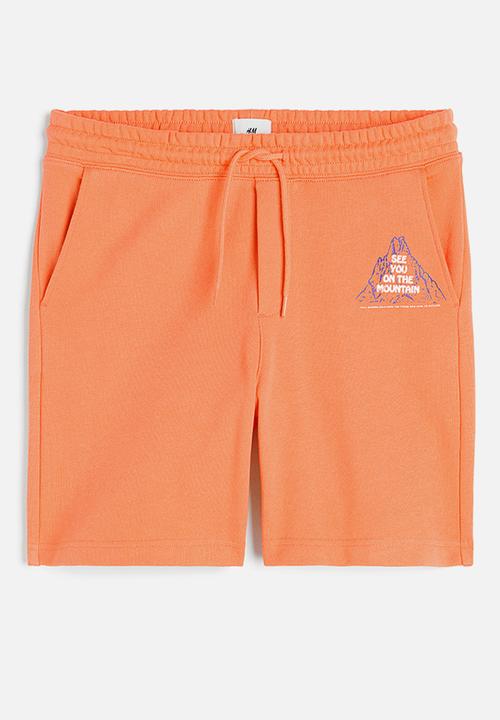 H&M - Relaxed fit printed sweatshorts - orange mountain