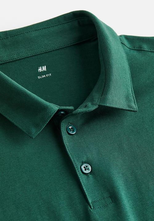 H&M - Slim fit polo shirt - dark green 