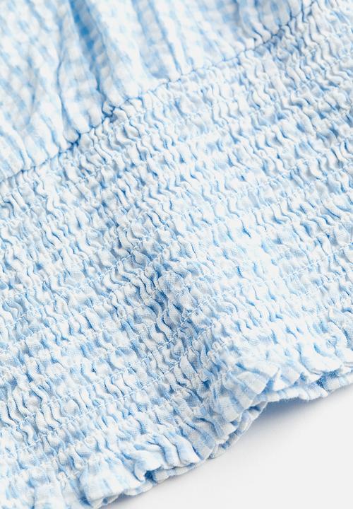 H&M - Puff-sleeved smocked blouse - light blue checked