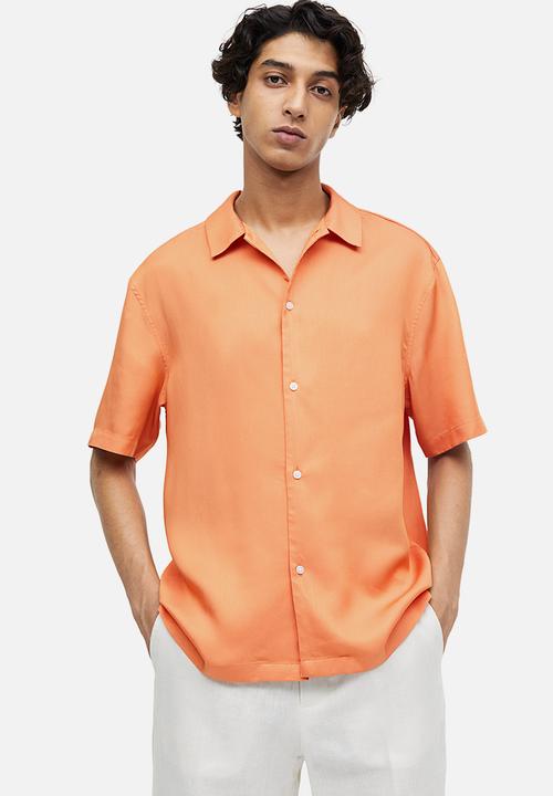 H&M - Regular fit short-sleeved lyocell shirt - apricot