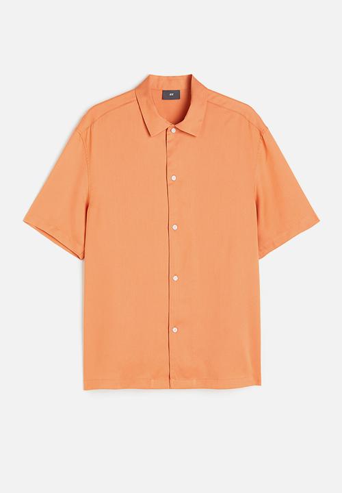 H&M - Regular fit short-sleeved lyocell shirt - apricot