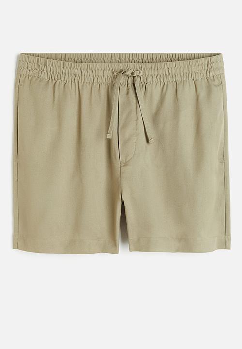 H&M - Regular fit lyocell shorts - sage green 