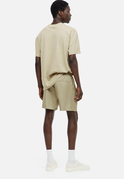 H&M - Regular fit lyocell shorts - sage green 