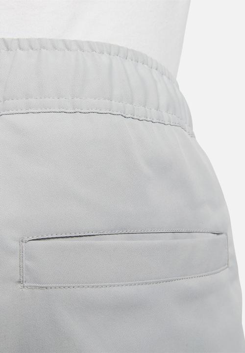 Nike - Nike club woven taper leg pants - light smoke grey