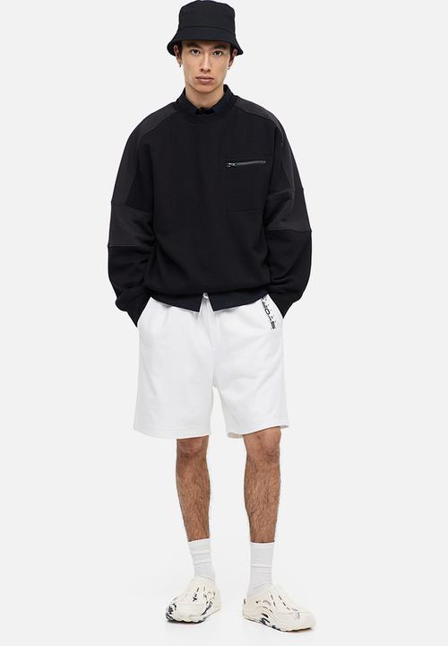 H&M - Relaxed fit printed sweat shorts - white story 
