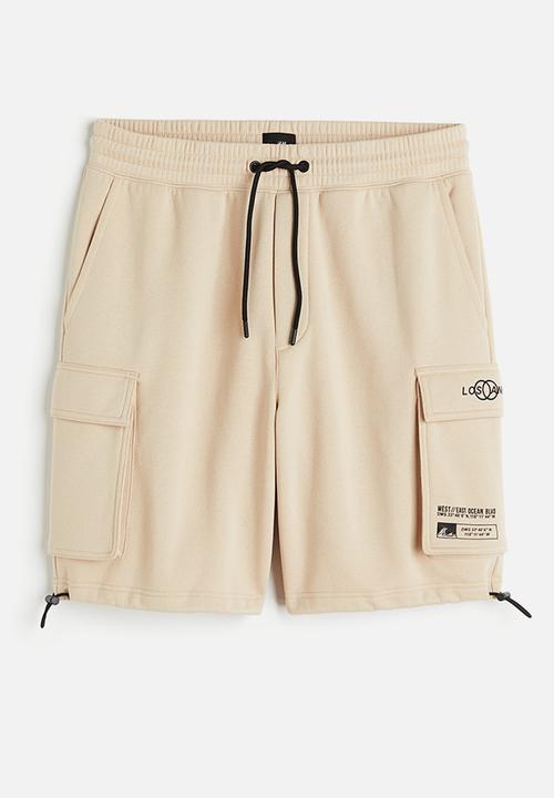 H&M - Relaxed fit printed cargo sweat shorts - beige los angeles
