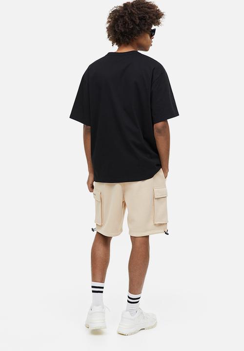 H&M - Relaxed fit printed cargo sweat shorts - beige los angeles