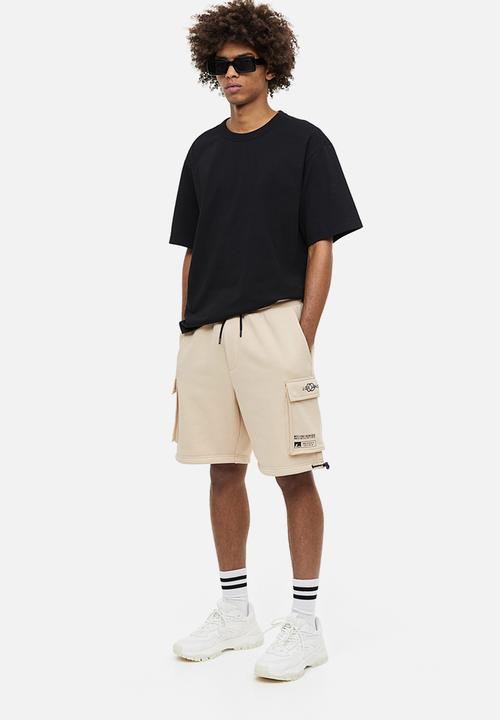 H&M - Relaxed fit printed cargo sweat shorts - beige los angeles