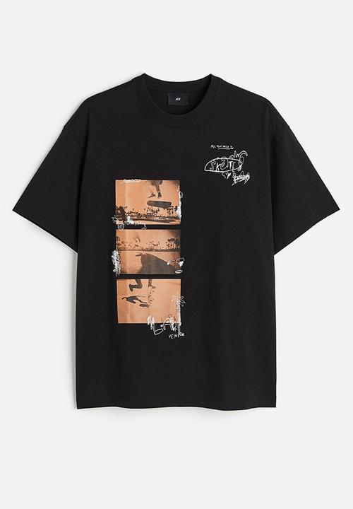 H&M - Relaxed fit printed T-shirt - black happens in la
