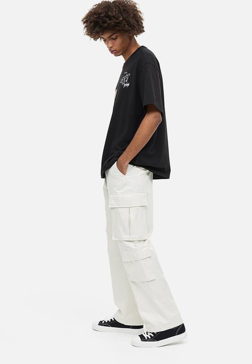 H&M - Relaxed fit printed T-shirt - black happens in la