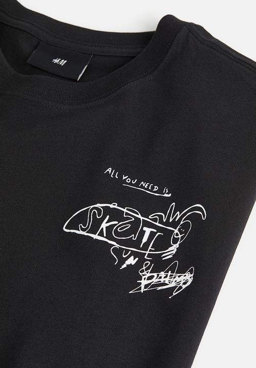 H&M - Relaxed fit printed T-shirt - black happens in la
