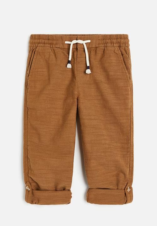 H&M - Loose fit roll-up trousers - brown