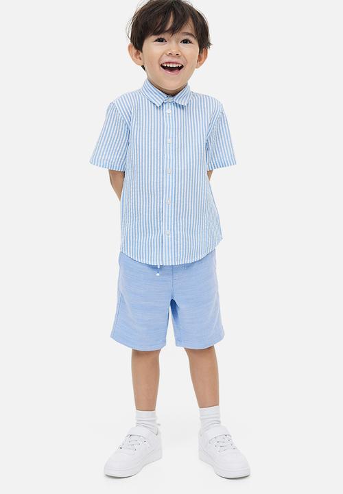 H&M - Loose fit chino shorts - light blue