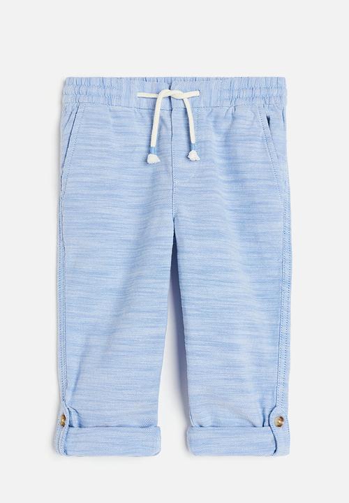 H&M - Loose fit roll-up trousers - light blue 