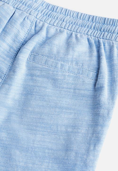H&M - Loose fit roll-up trousers - light blue 