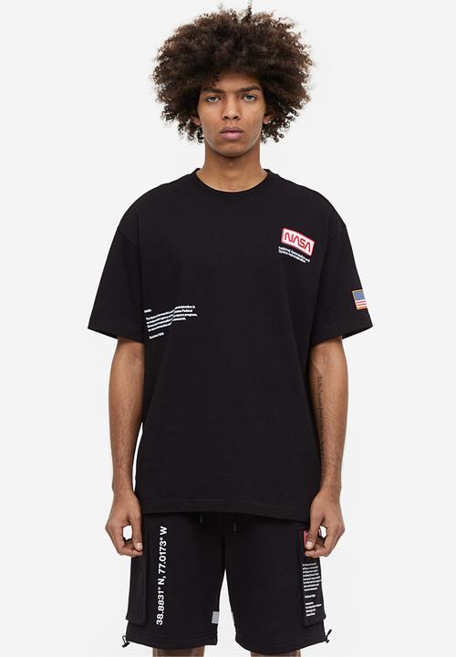 H&M - Printed sweatshirt shorts - black nasa