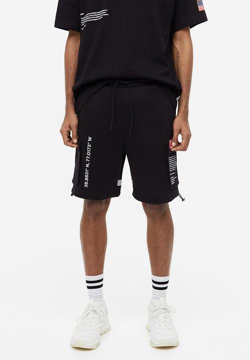 H&M - Printed sweatshirt shorts - black nasa