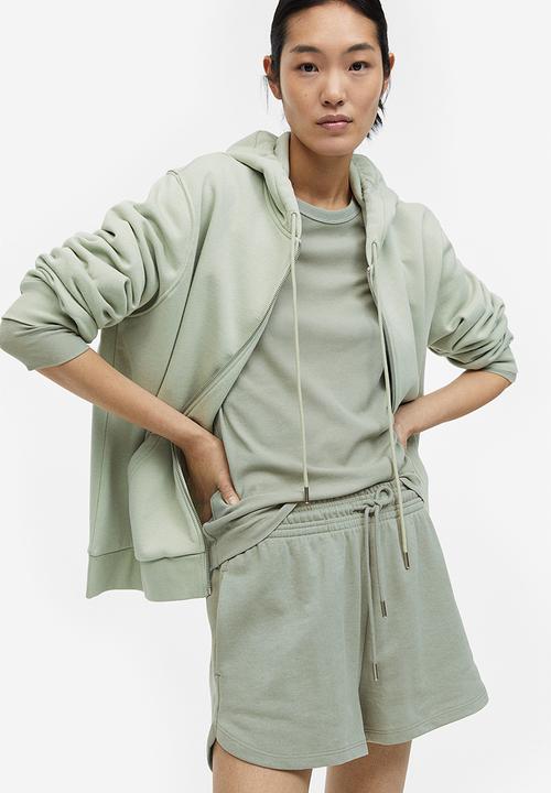 H&M - Sweatshirt shorts - sage green 