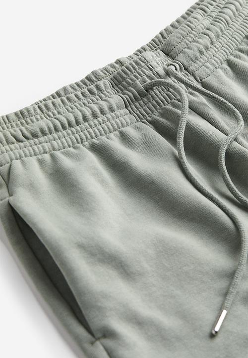 H&M - Sweatshirt shorts - sage green 