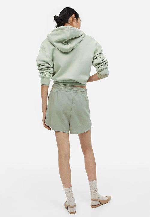 H&M - Sweatshirt shorts - sage green 