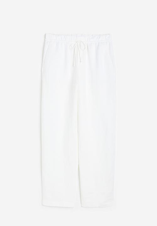 H&M - Linen-blend tapered trousers - white