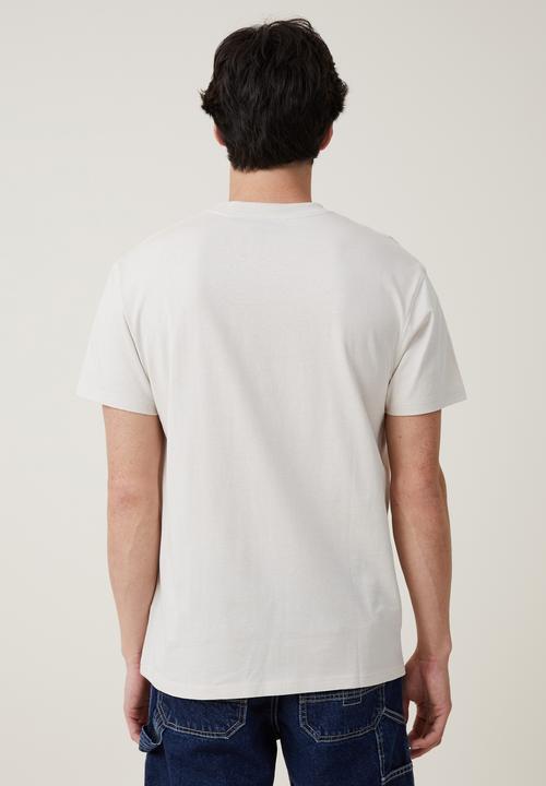 Cotton On - Loose fit music T-shirt - lcn bra bone/inxs