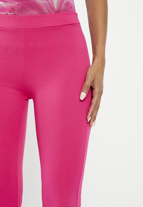 HAILYS - Flared leg trousers - pink