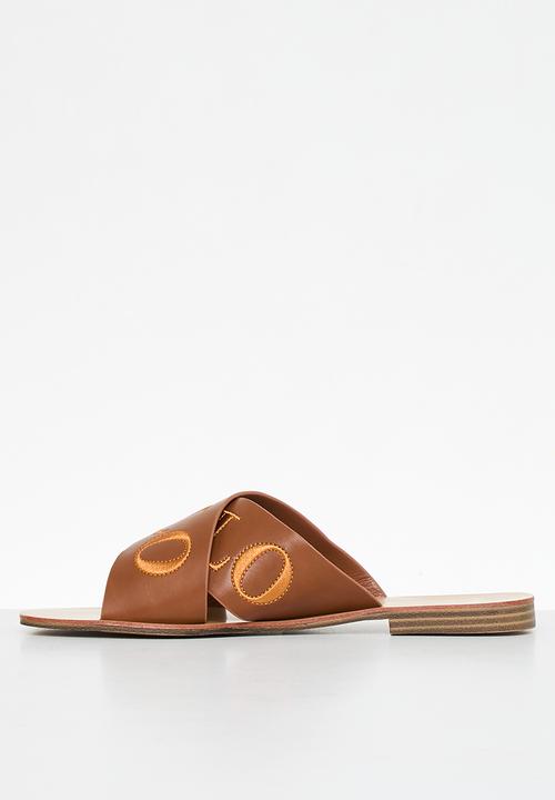 POLO - Cross strap embroidered mule - tan