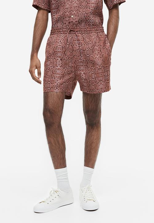 H&M - Regular fit lyocell shorts - dark red snakeskin patterned