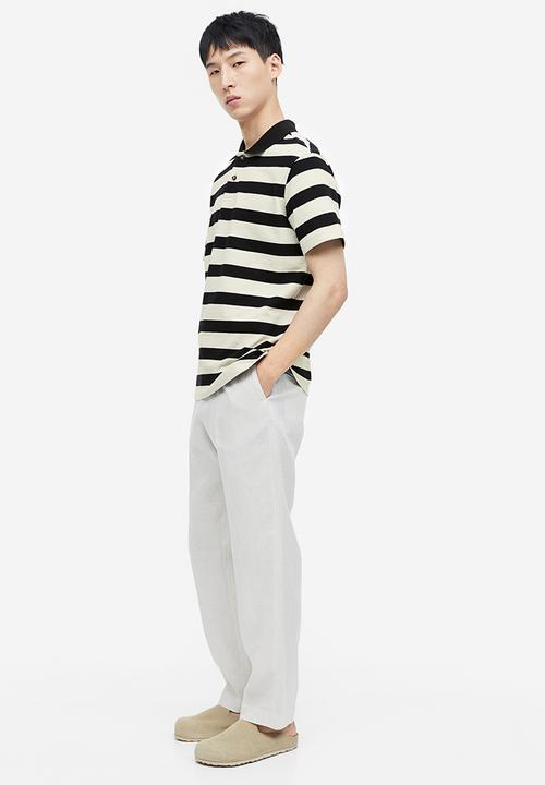 H&M - Relaxed fit terry polo shirt - black & white striped