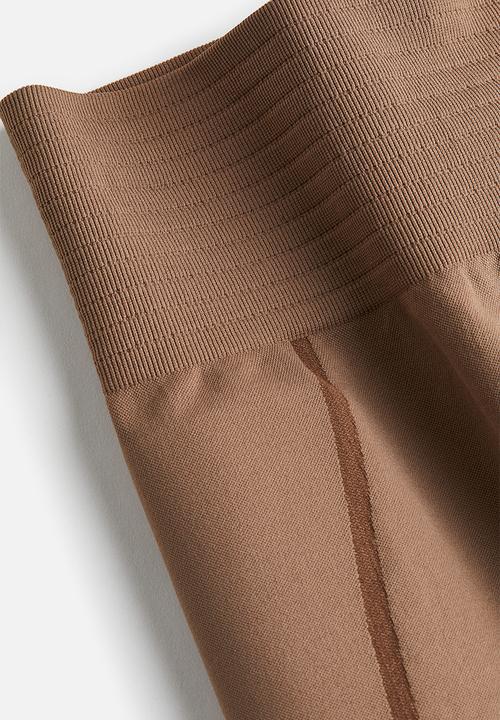 H&M - Drymove™ seamless shaping shorts - light brown