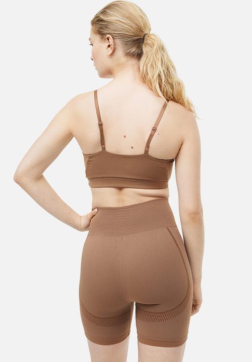 H&M - Drymove™ seamless shaping shorts - light brown