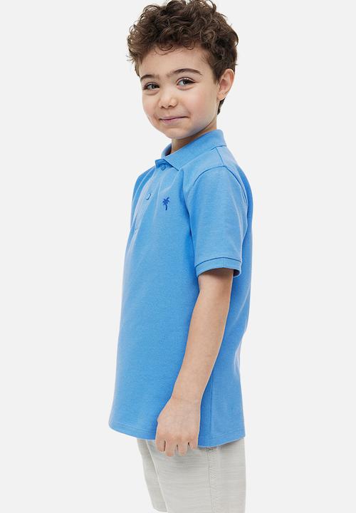 H&M - Cotton piqué polo shirt - light blue 