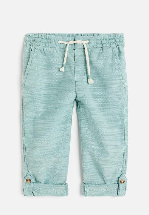 H&M - Loose fit roll-up trousers - light turquoise