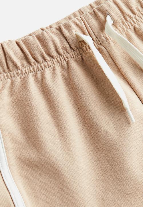 H&M - Cotton sweatshorts - light beige